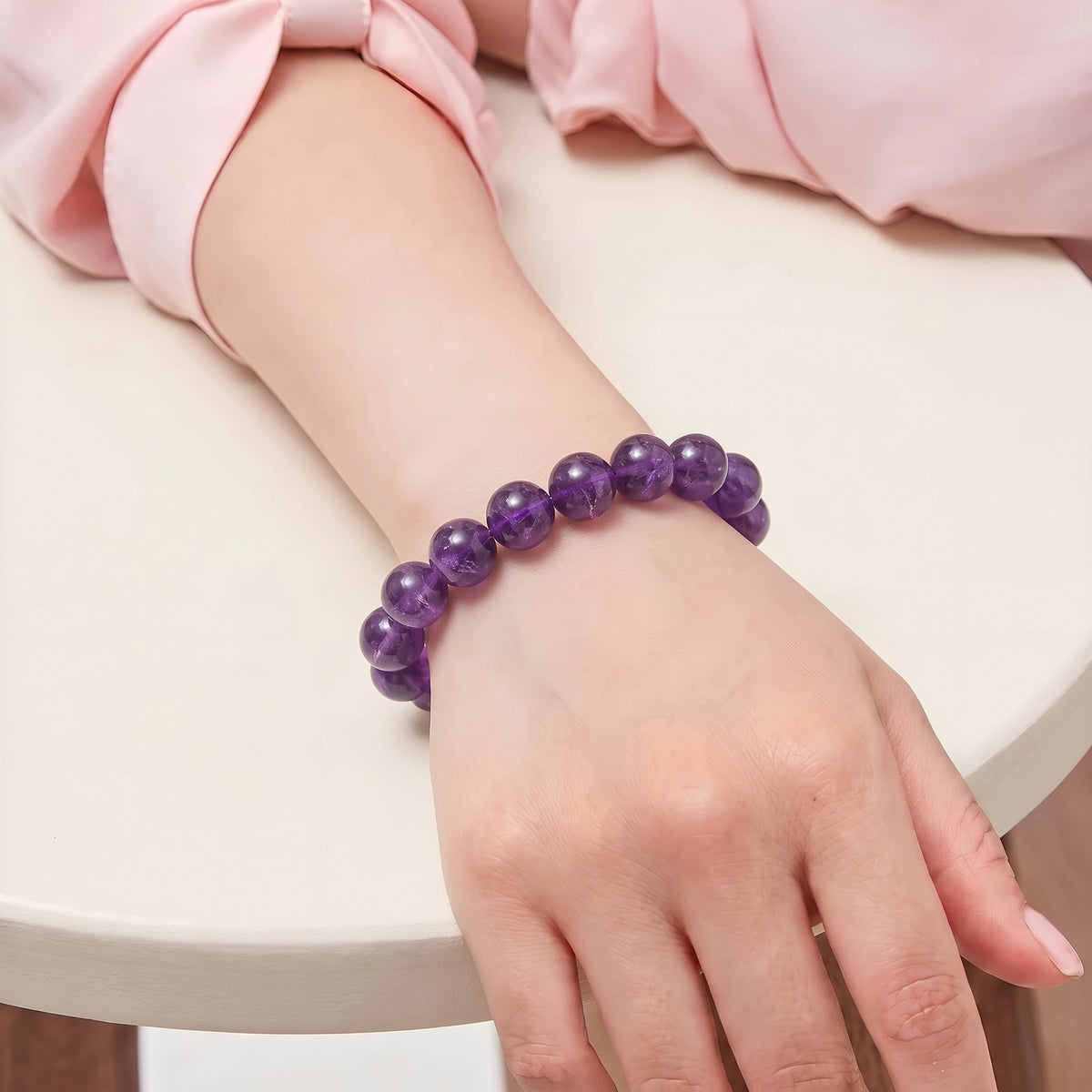 Amethyst 10mm Beaded Gemstone Bracelet worn on wrist – Kaashir Jewelry