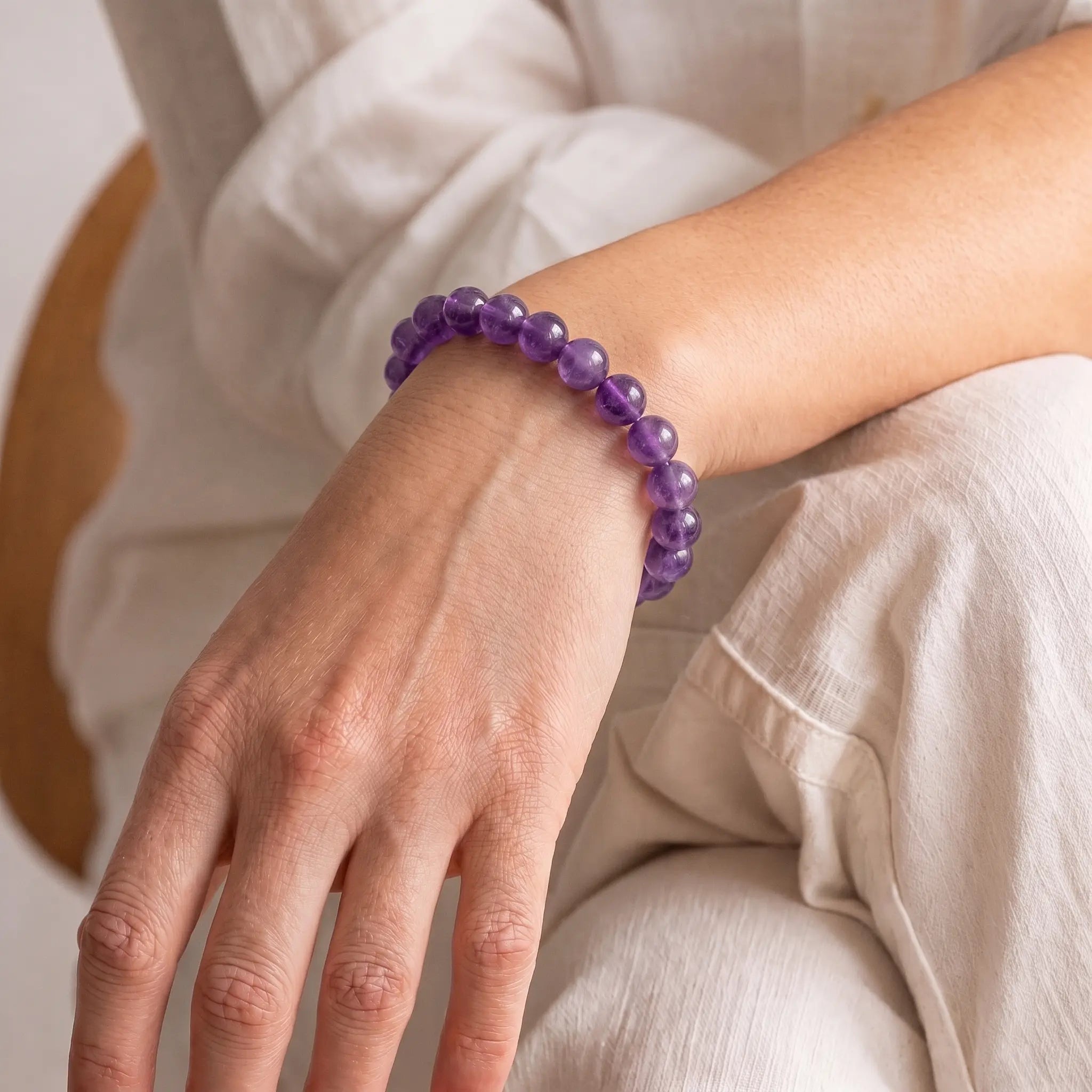 Amethyst 8mm Beaded Gemstone Bracelet worn on wrist – Kaashir Jewelry