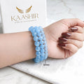 Aquamarine 6mm Beaded Gemstone Bracelet worn on wrist – Kaashir Jewelry