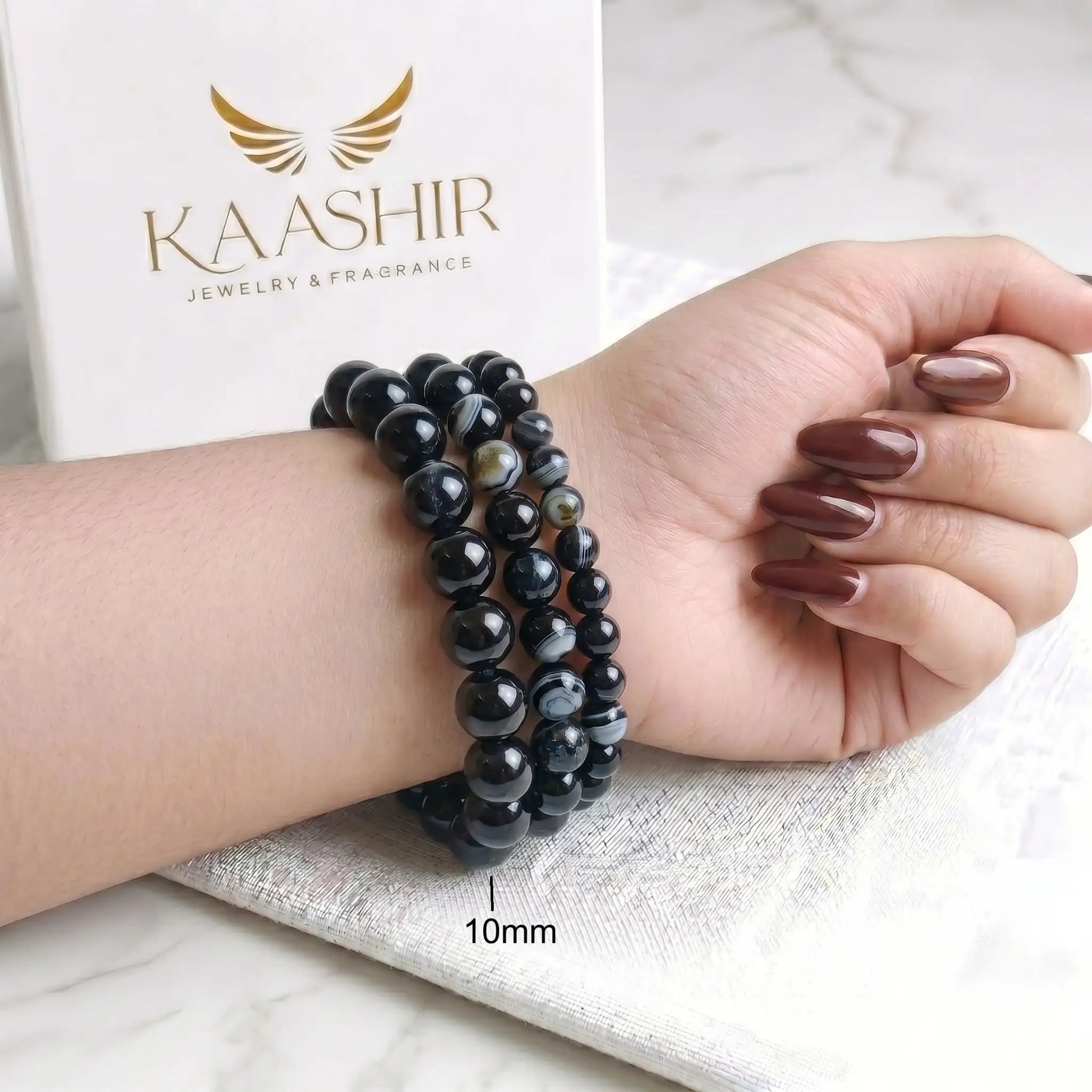 Black Banded Agate 10mm Beaded Gemstone Bracelet worn on wrist – Kaashir Jewelry