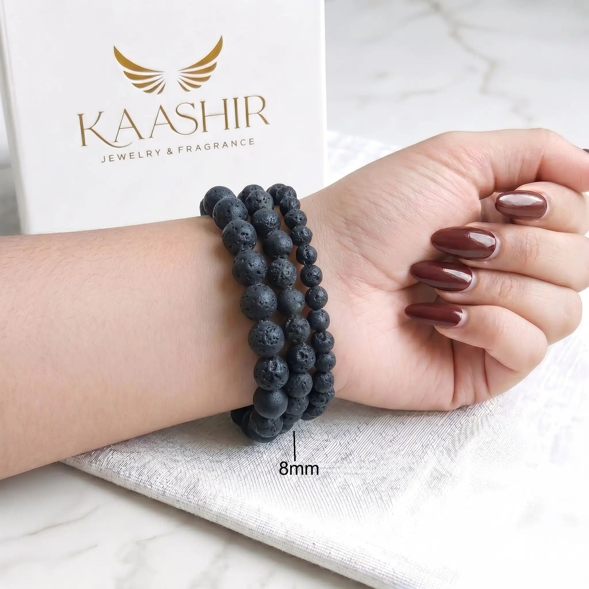 Black Lava Stone 8mm Beaded Gemstone Bracelet worn on wrist – Kaashir Jewelry