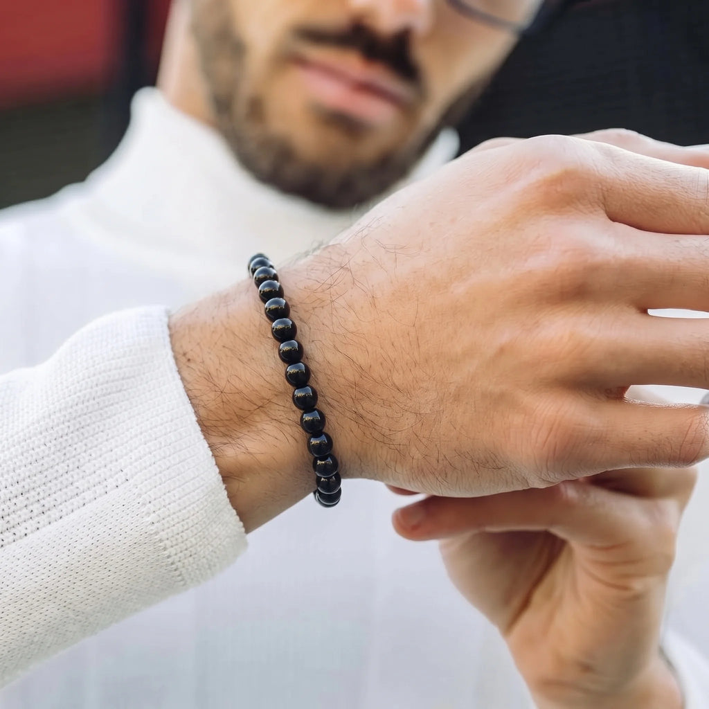 Black Obsidian 6mm Beaded Gemstone Bracelet worn on wrist – Kaashir Jewelry