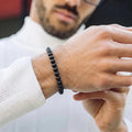 Black Obsidian 6mm Beaded Gemstone Bracelet worn on wrist – Kaashir Jewelry