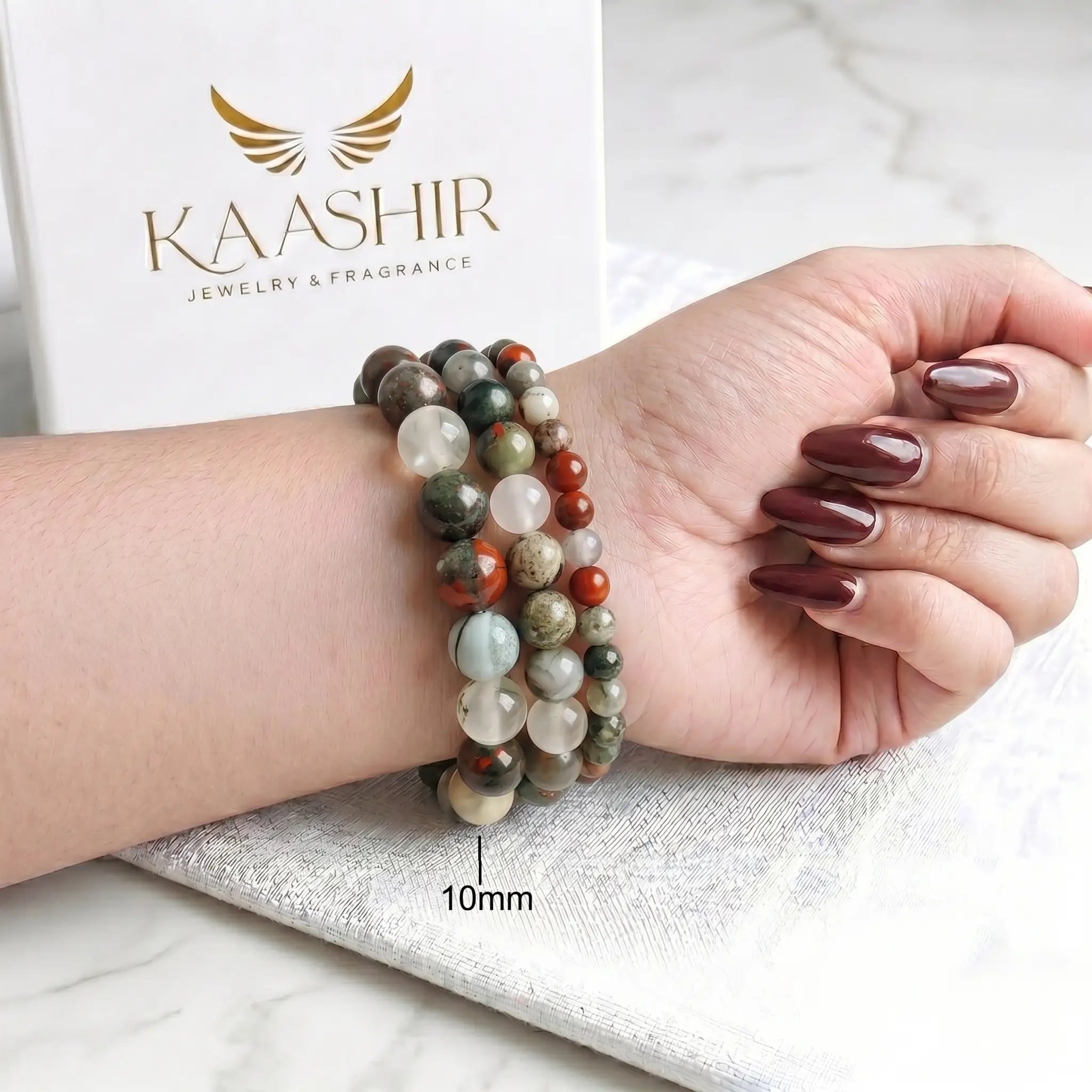 Bloodstone 10mm Beaded Gemstone Bracelet worn on wrist – Kaashir Jewelry