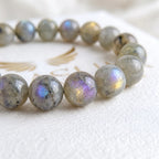 Close-up of natural labradorite beads showing colour variation — Kaashir gemstone bracelet
