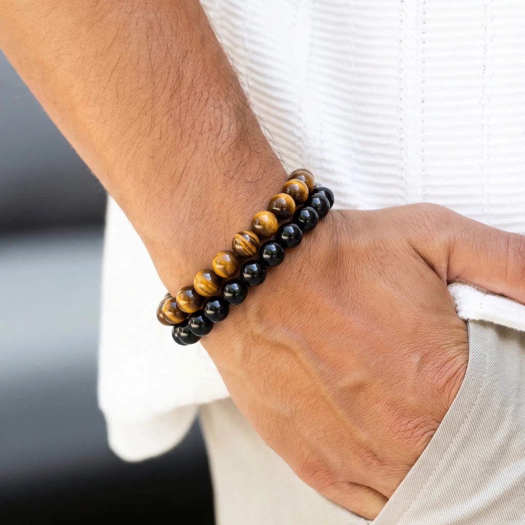 Tiger Eye and Black Obsidian 8mm bracelet set worn together on a man's wrist