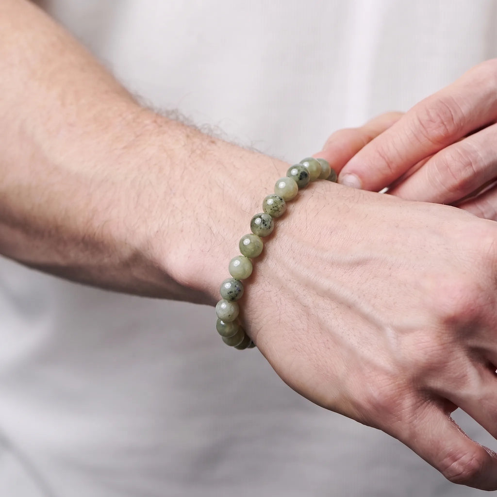 Labradorite bracelet worn on man's wrist — unisex natural stone bracelet by Kaashir
