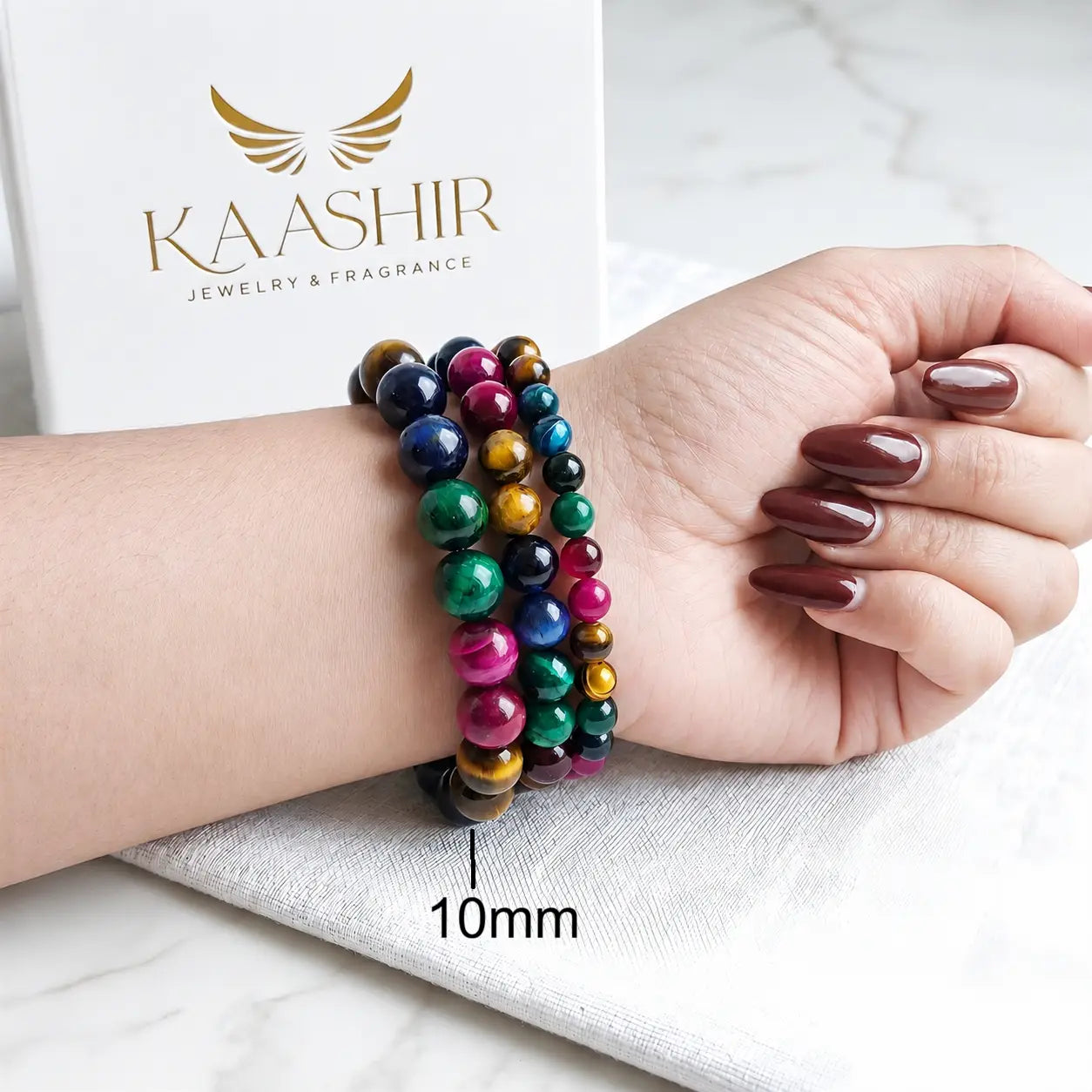 Multi Tiger Eye Yellow Green Blue Pink 10mm Beaded Gemstone Bracelet worn on wrist – Kaashir Jewelry