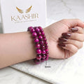 Pink Tiger Eye 6mm Beaded Gemstone Bracelet worn on wrist – Kaashir Jewelry