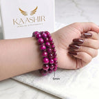 Pink Tiger Eye 6mm Beaded Gemstone Bracelet worn on wrist – Kaashir Jewelry