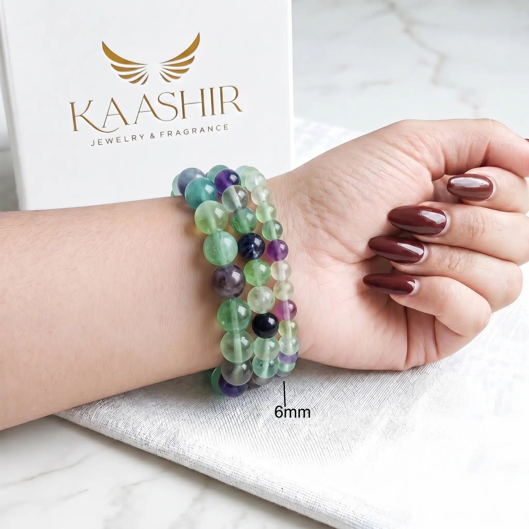 Rainbow Fluorite 6mm Beaded Gemstone Bracelet worn on wrist – Kaashir Jewelry