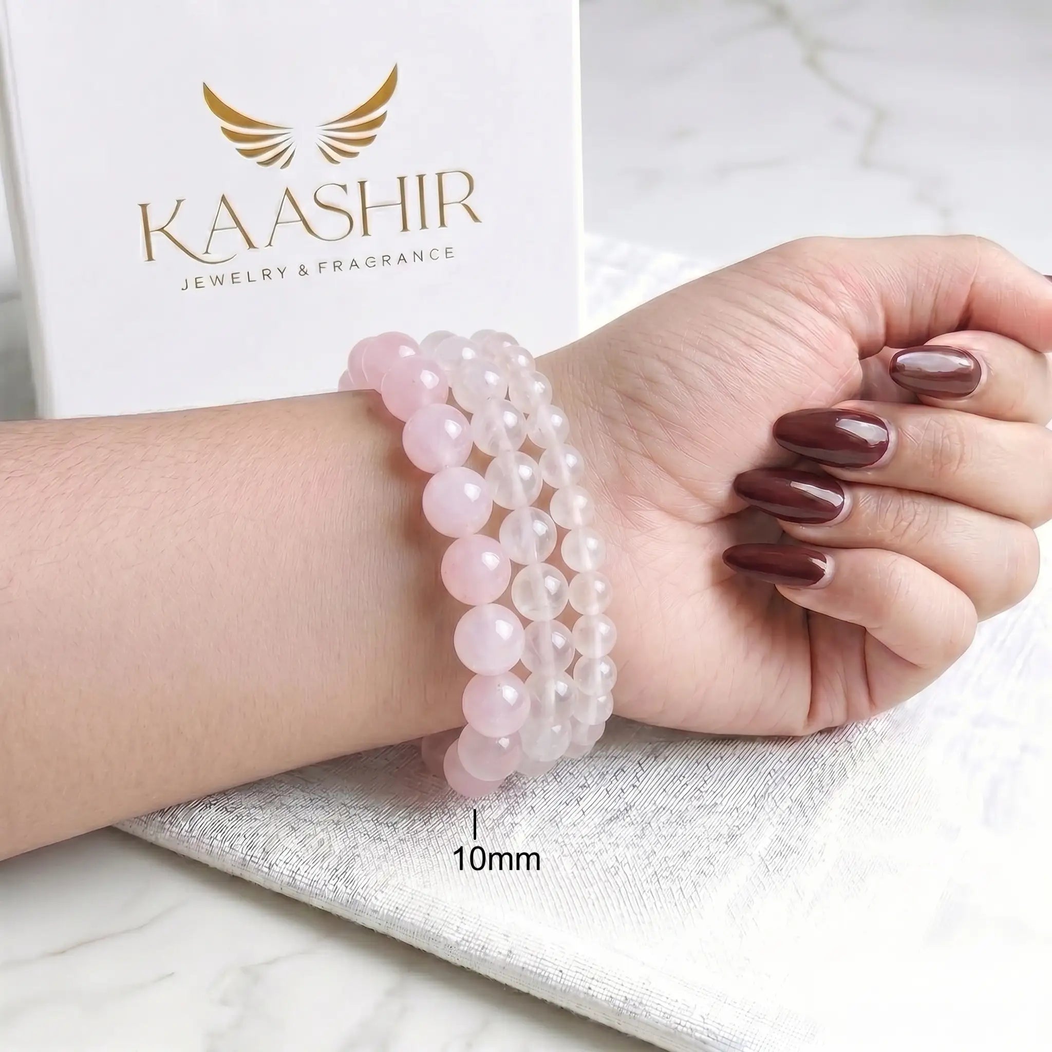 Rose Quartz 10mm Beaded Gemstone Bracelet worn on wrist – Kaashir Jewelry