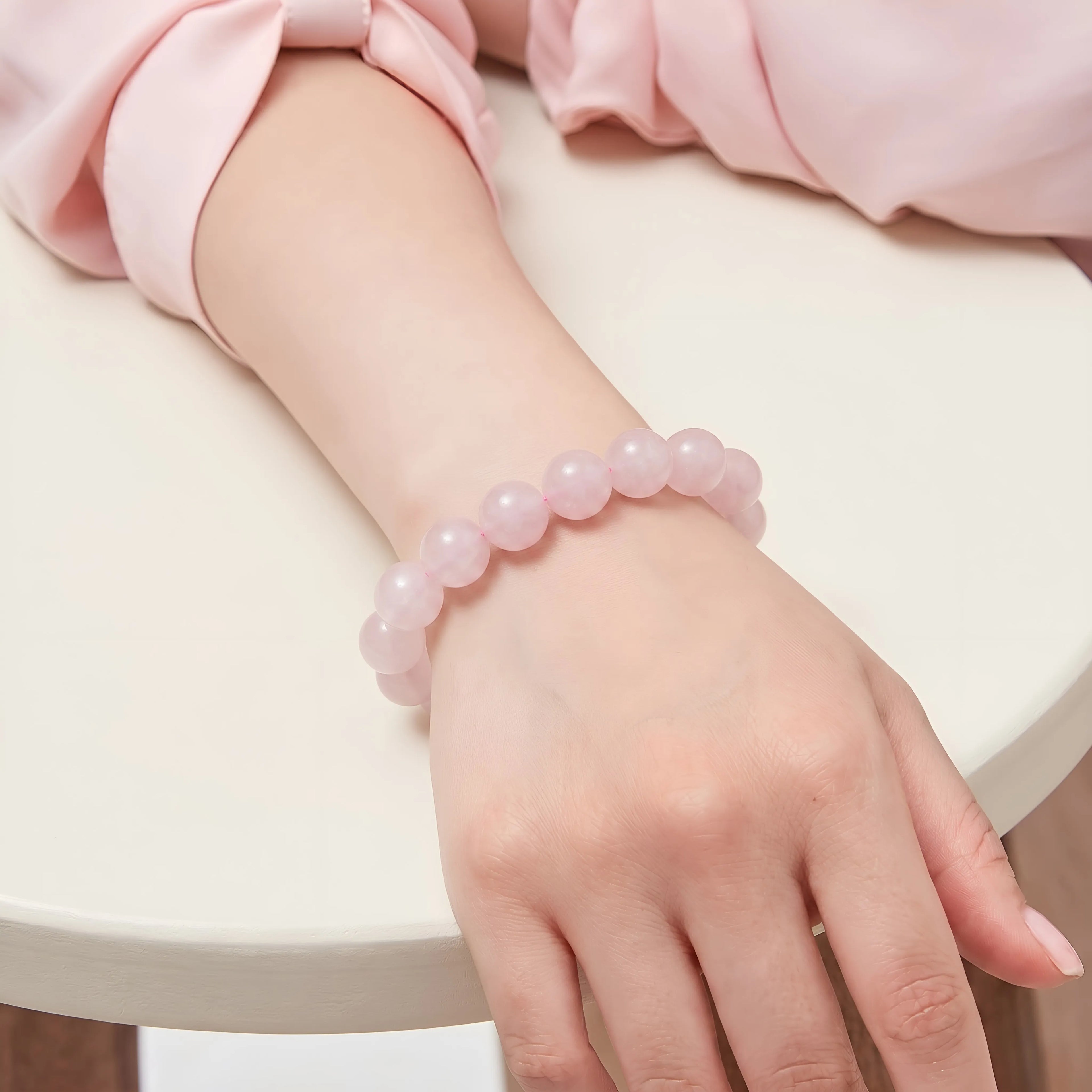 rose quartz bracelet worn on wrist love peace positive energy