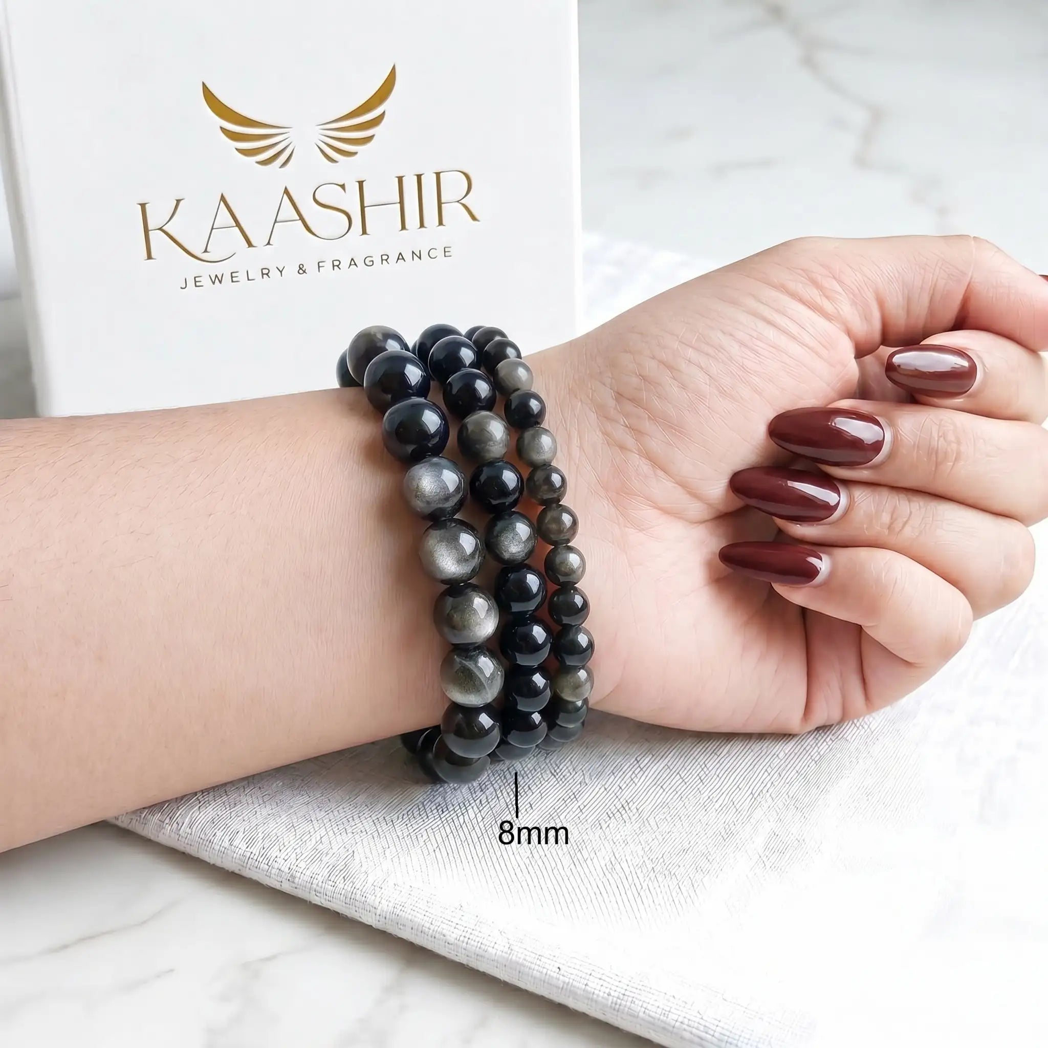 Silver Sheen Obsidian 8mm Beaded Gemstone Bracelet worn on wrist – Kaashir Jewelry