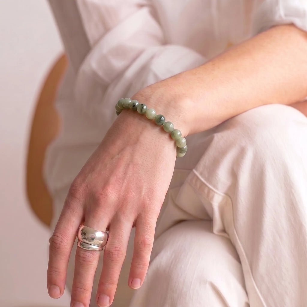 Labradorite bracelet worn on woman's wrist — handmade gemstone bracelet by Kaashir