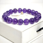 amethyst bracelet natural stone beads close up purple detail