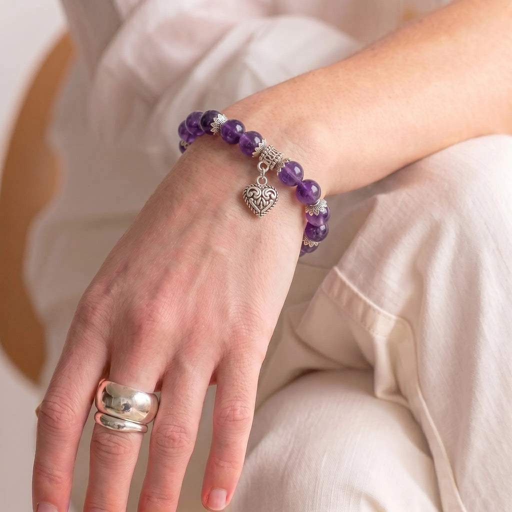 Sterling silver heart charm on amethyst beaded bracelet — handmade gemstone jewelry