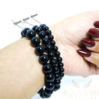 Black agate bracelet show the 6mm 8mm 10mm bead size scale.