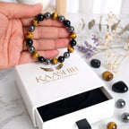 Polished black obsidian beads detail in triple protection bracelet