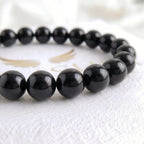 black obsidian bracelet natural stone beads close up volcanic glass