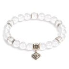 Clear quartz heart charm bracelet 8mm — transparent crystal beads with ornate silver heart charm