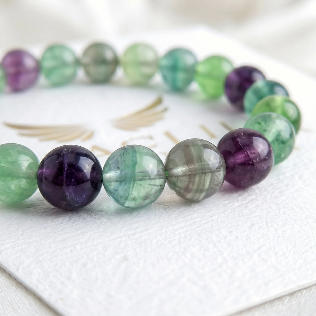 fluorite bracelet natural stone beads close up multicolor purple green