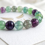 fluorite bracelet natural stone beads close up multicolor purple green