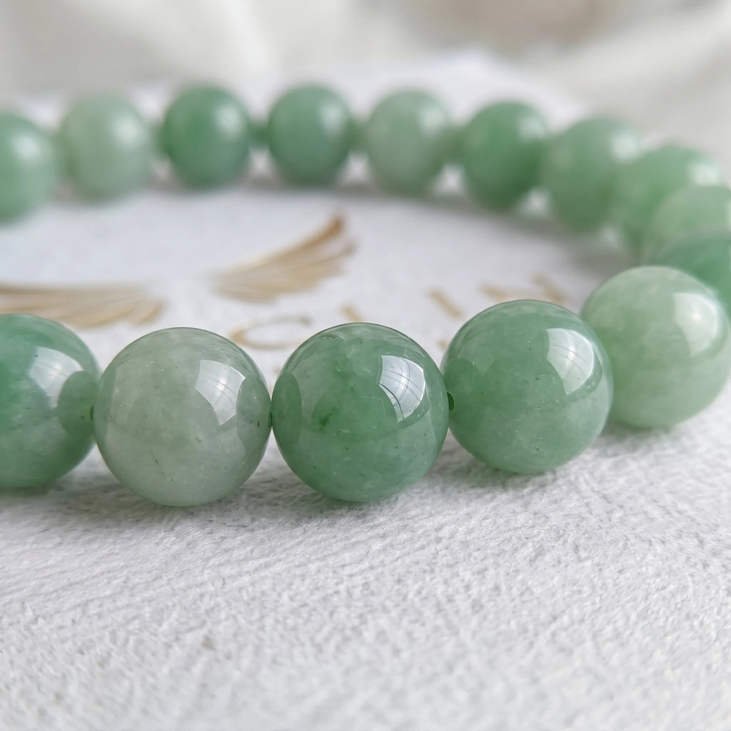 green aventurine bracelet natural stone beads close up green shimmer