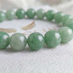 green aventurine bracelet natural stone beads close up green shimmer