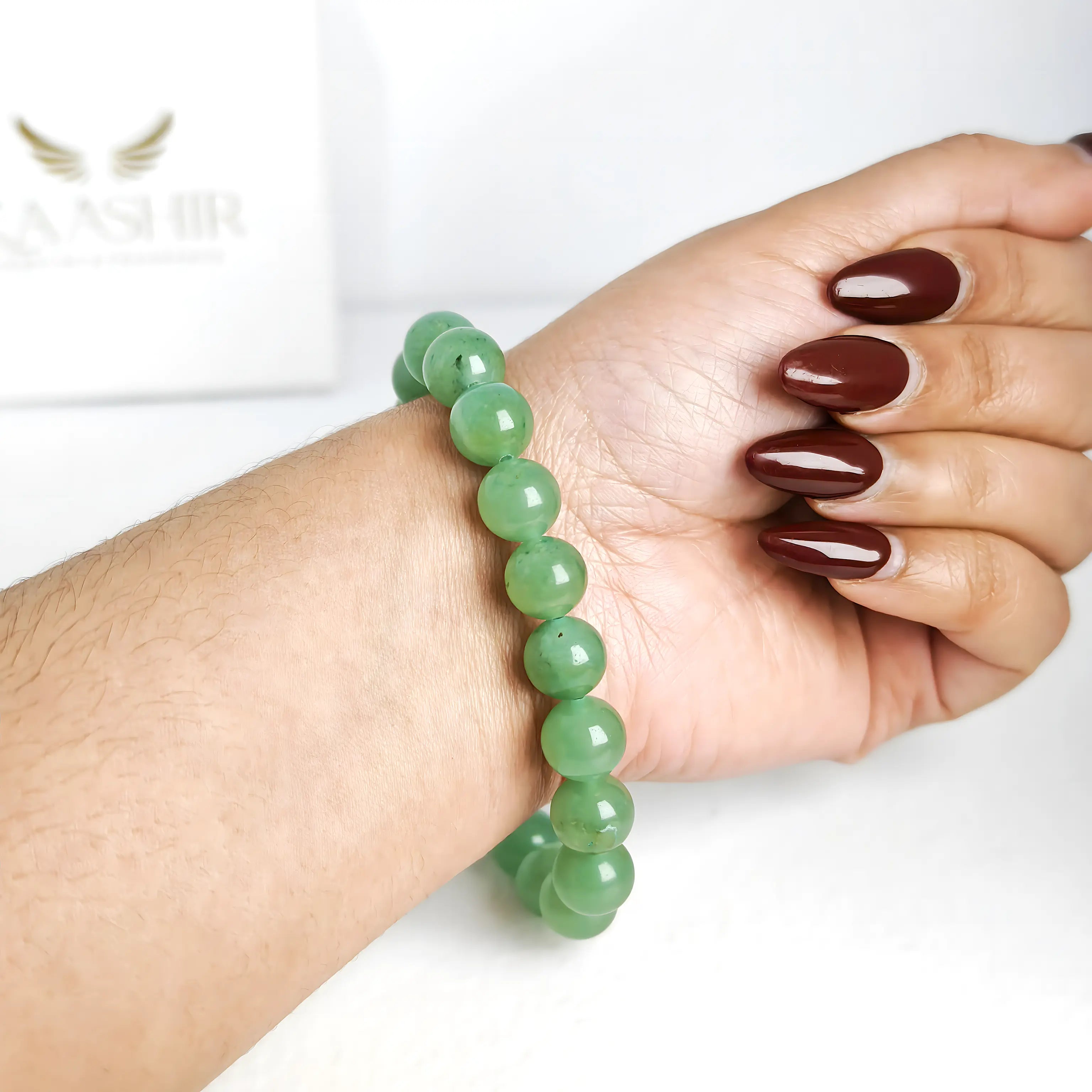 Green aventurine bracelet worn on hand for a stylish and elegant look