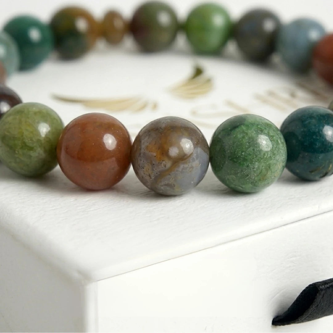 agate bracelet natural stone beads close up earthy multicolor detail