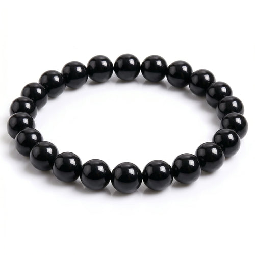 Kaashir Black Agate natural gemstone beaded bracelet with high-gloss finish on white background