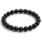 Kaashir Black Obsidian natural gemstone beaded bracelet with high-gloss finish on white background
