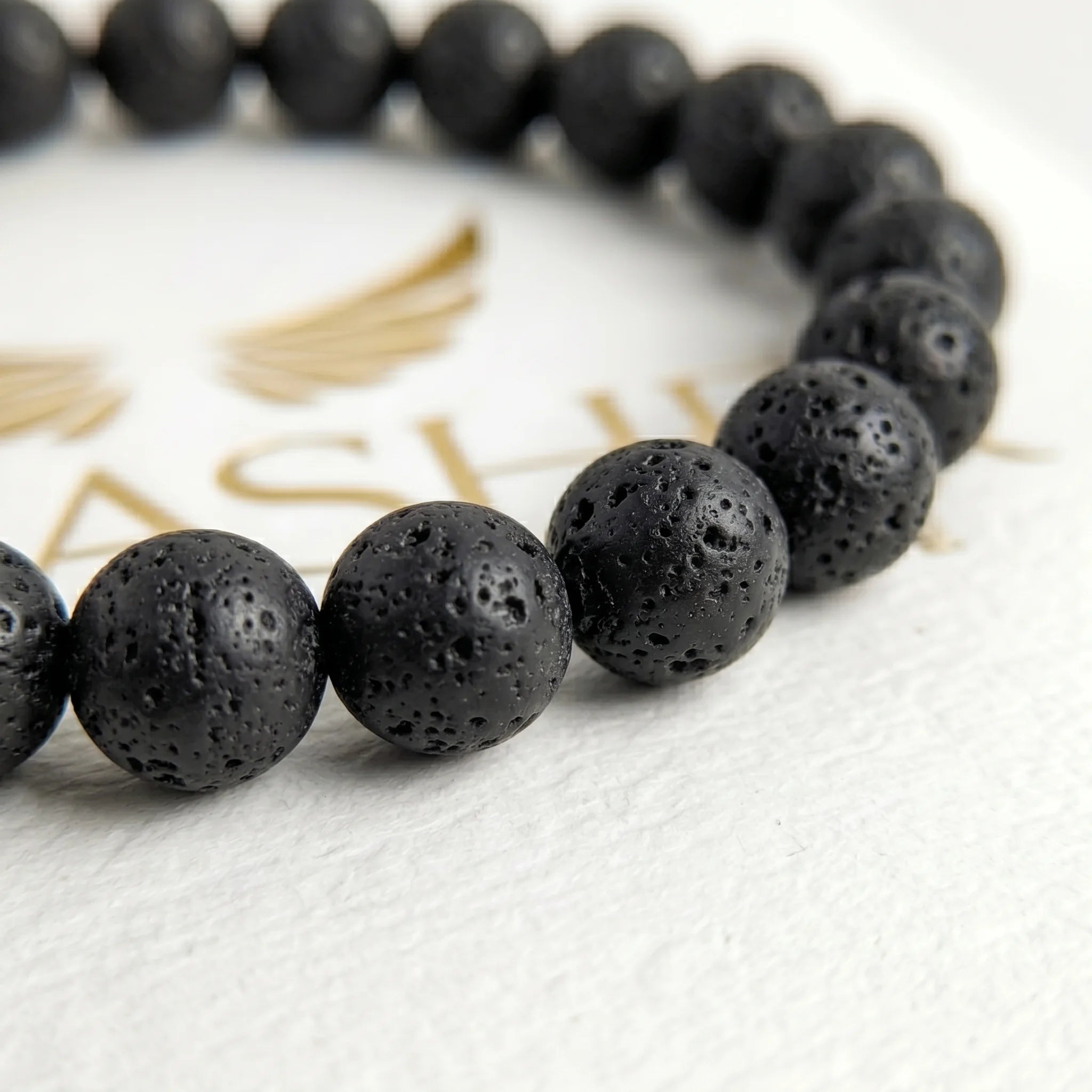 lava stone bracelet natural porous volcanic beads close up texture
