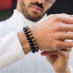 Man wearing Tiger Eye and Black Obsidian gemstone bracelets together