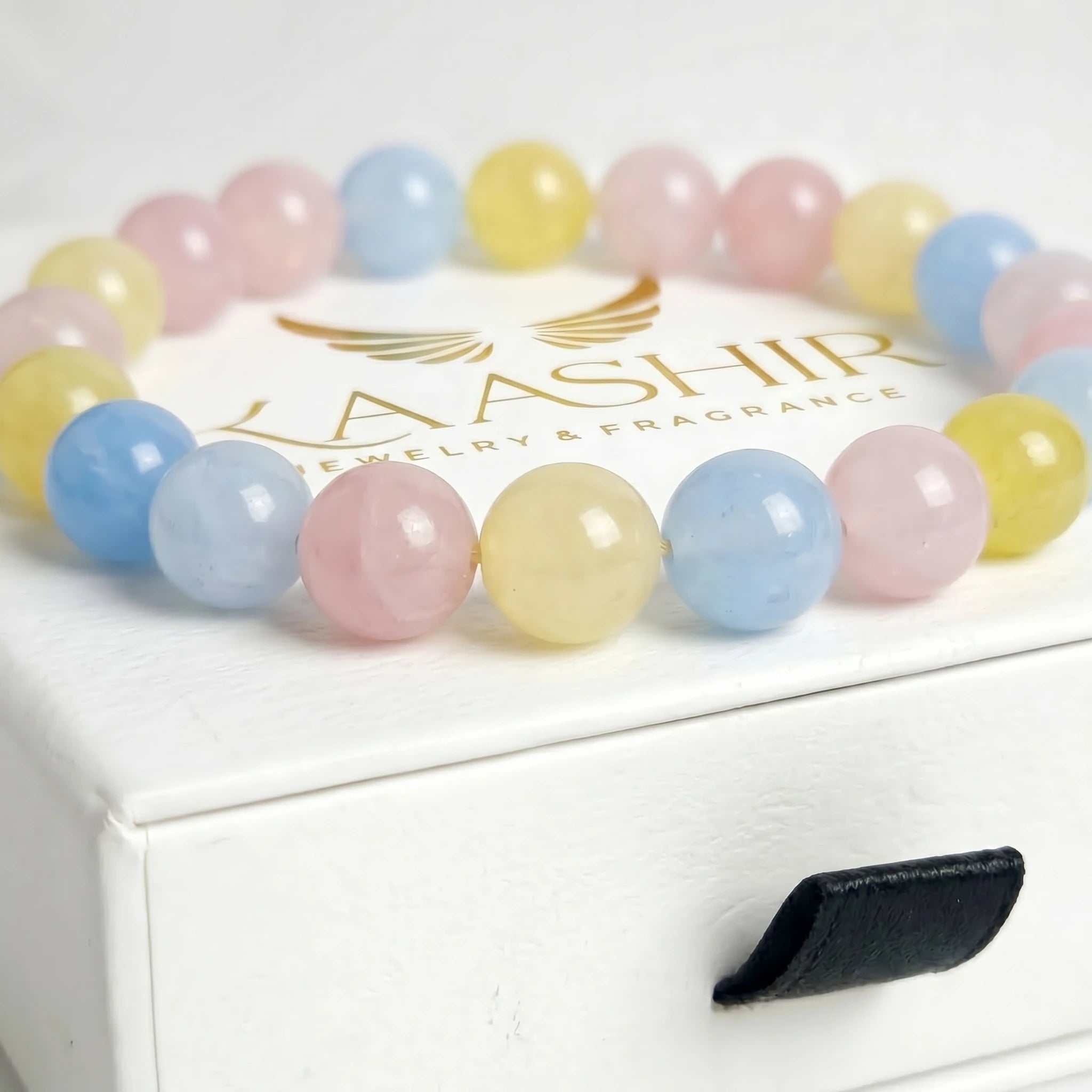 multi morganite bracelet natural stone beads close up pink blue yellow tones