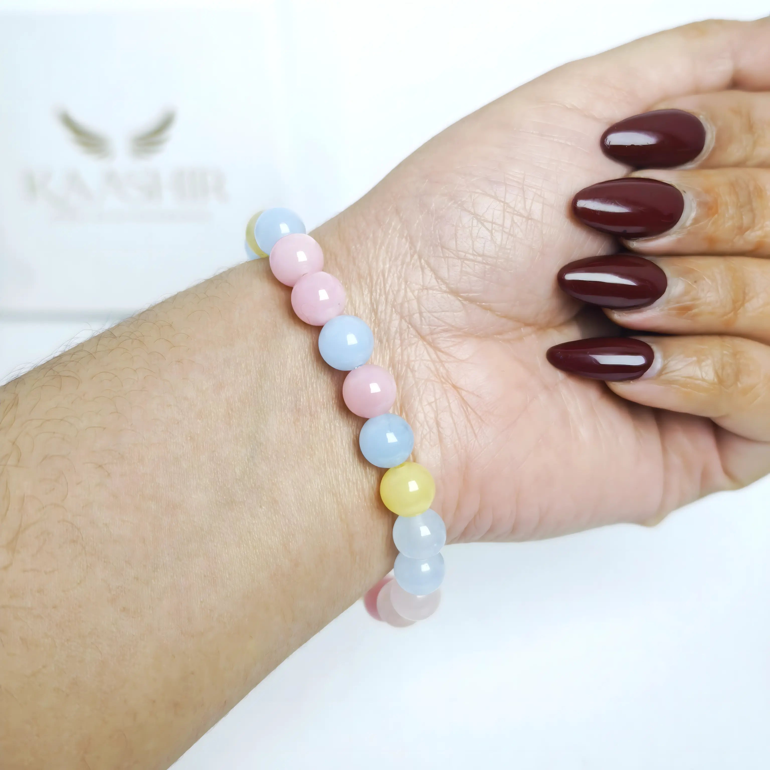 morganite bracelet worn on wrist love compassion emotional healing