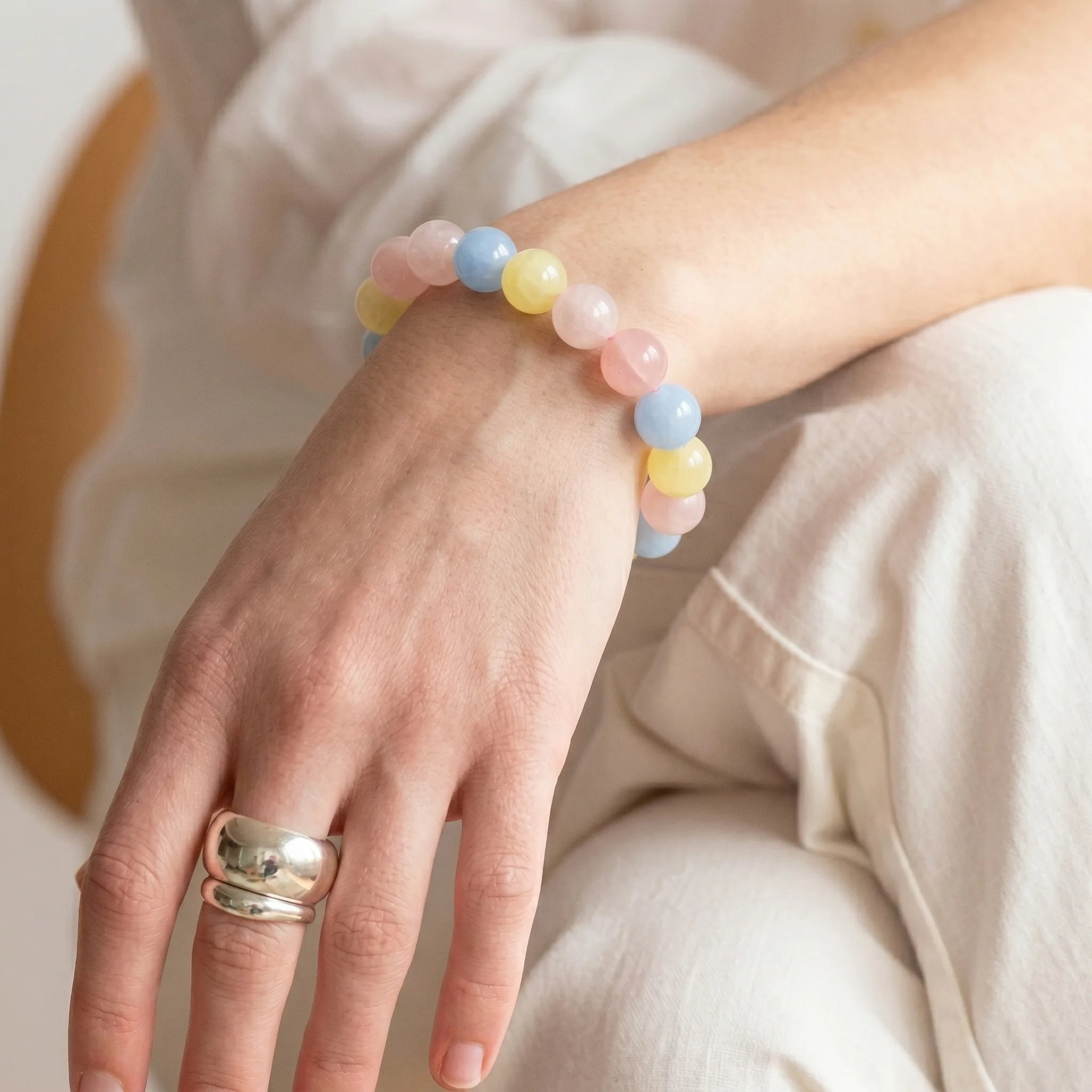 morganite bracelet worn on wrist love compassion emotional healing