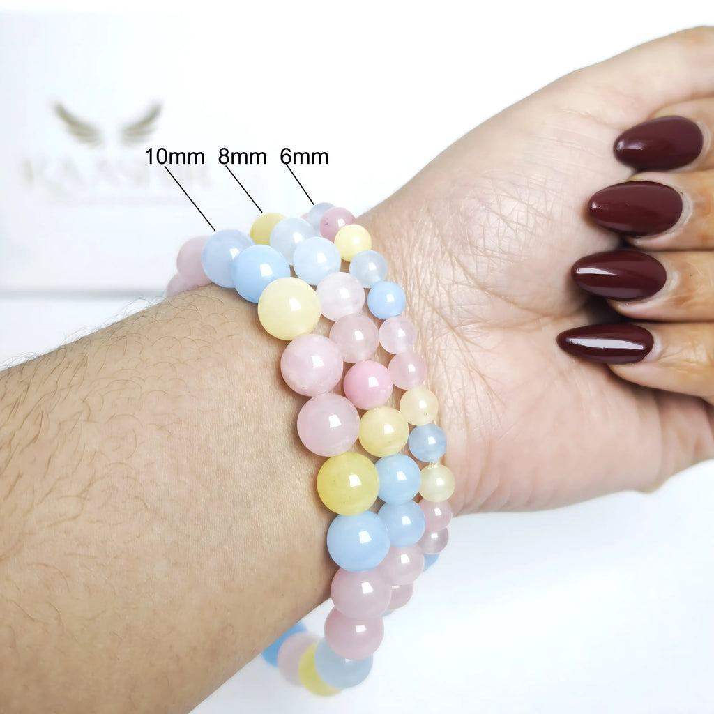 Detail of elastic cord and bead arrangement in multi Morganite bracelet