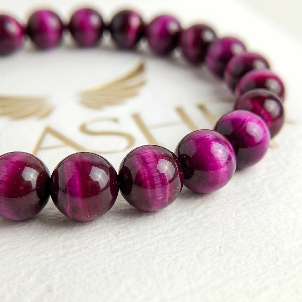 pink tiger eye bracelet natural stone beads close up detail