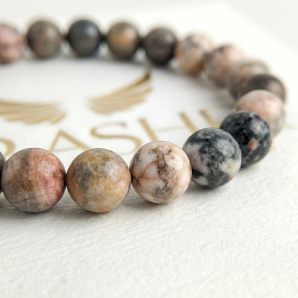 pink zebra jasper bracelet natural stone beads close up pink pattern