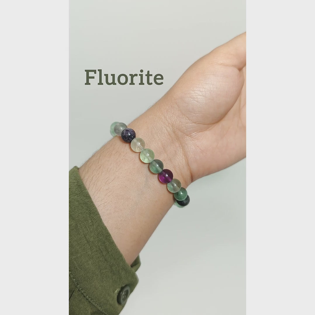 Rainbow Fluorite beaded bracelet featuring natural multicolored purple, green, and blue gemstones with complete Kaashir gift packaging