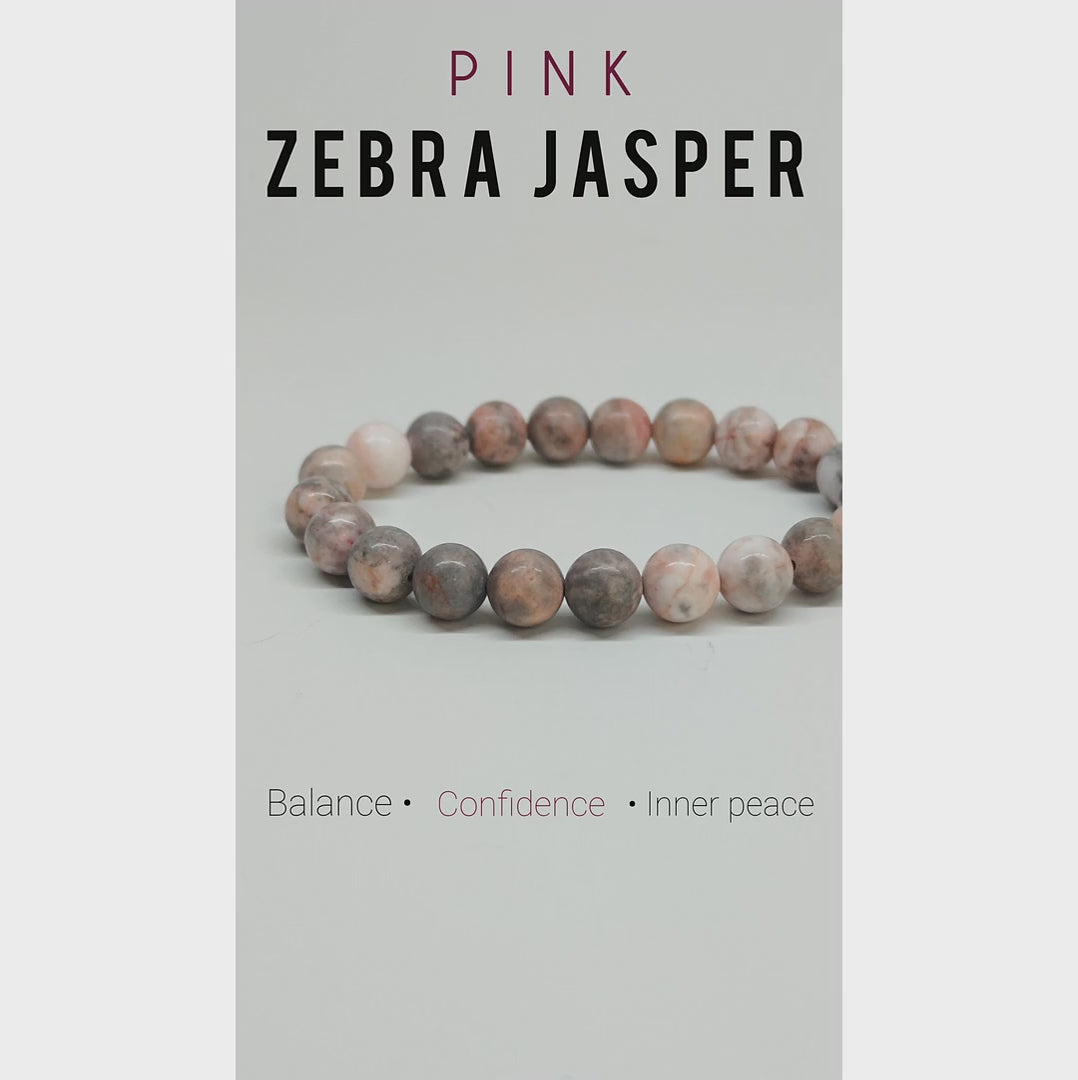 Pink Zebra Jasper beaded bracelet featuring natural pink and cream zebra-patterned gemstones, shown on a wrist