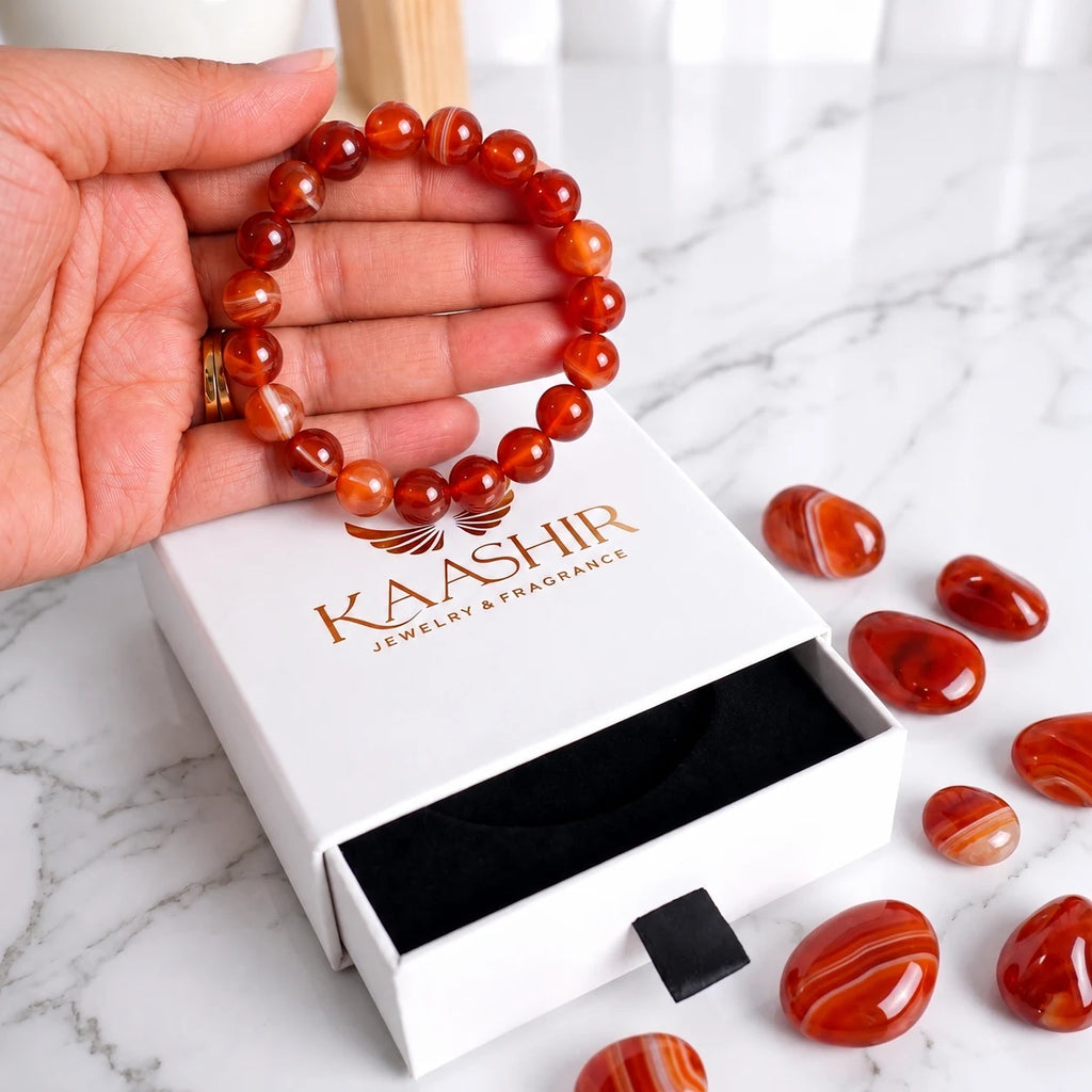 Close-up of genuine red banded agate bracelet beads - natural gemstone jewelry