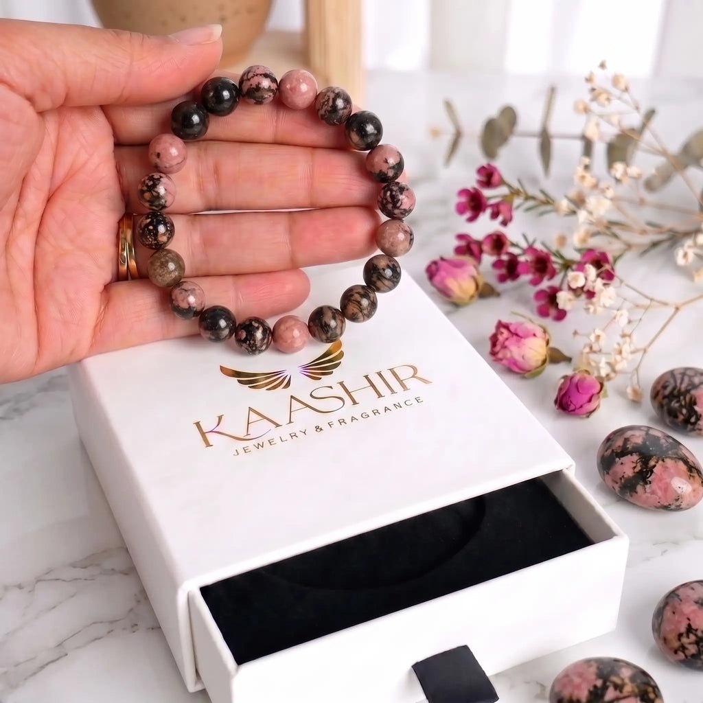 Natural rhodonite crystal bracelet beads — genuine pink and black gemstone jewelry