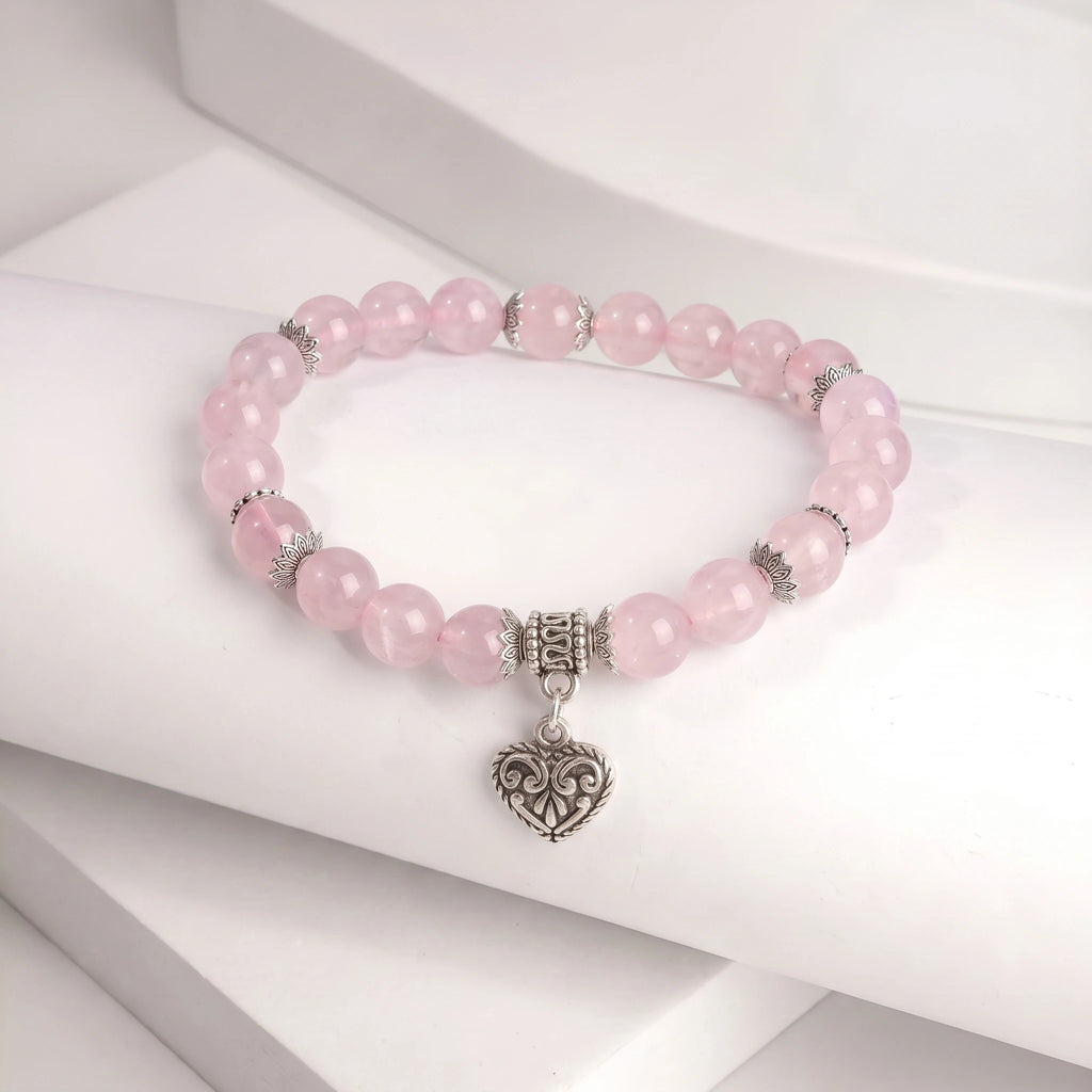 Rose quartz bracelet 8mm beads on wrist — everyday natural stone bracelet Kaashir