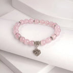 Rose quartz bracelet 8mm beads on wrist — everyday natural stone bracelet Kaashir
