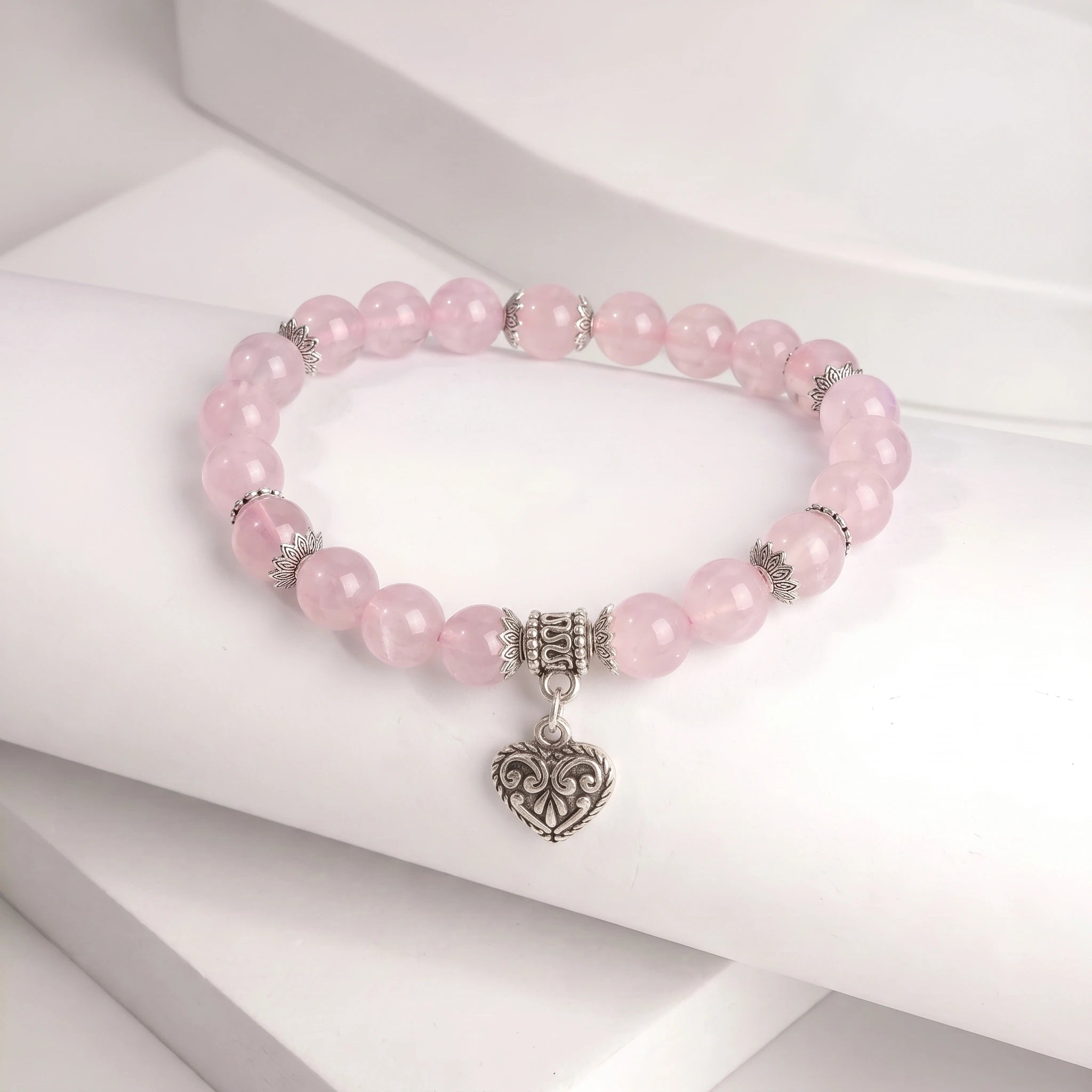 Rose quartz bracelet 8mm beads on wrist — everyday natural stone bracelet Kaashir