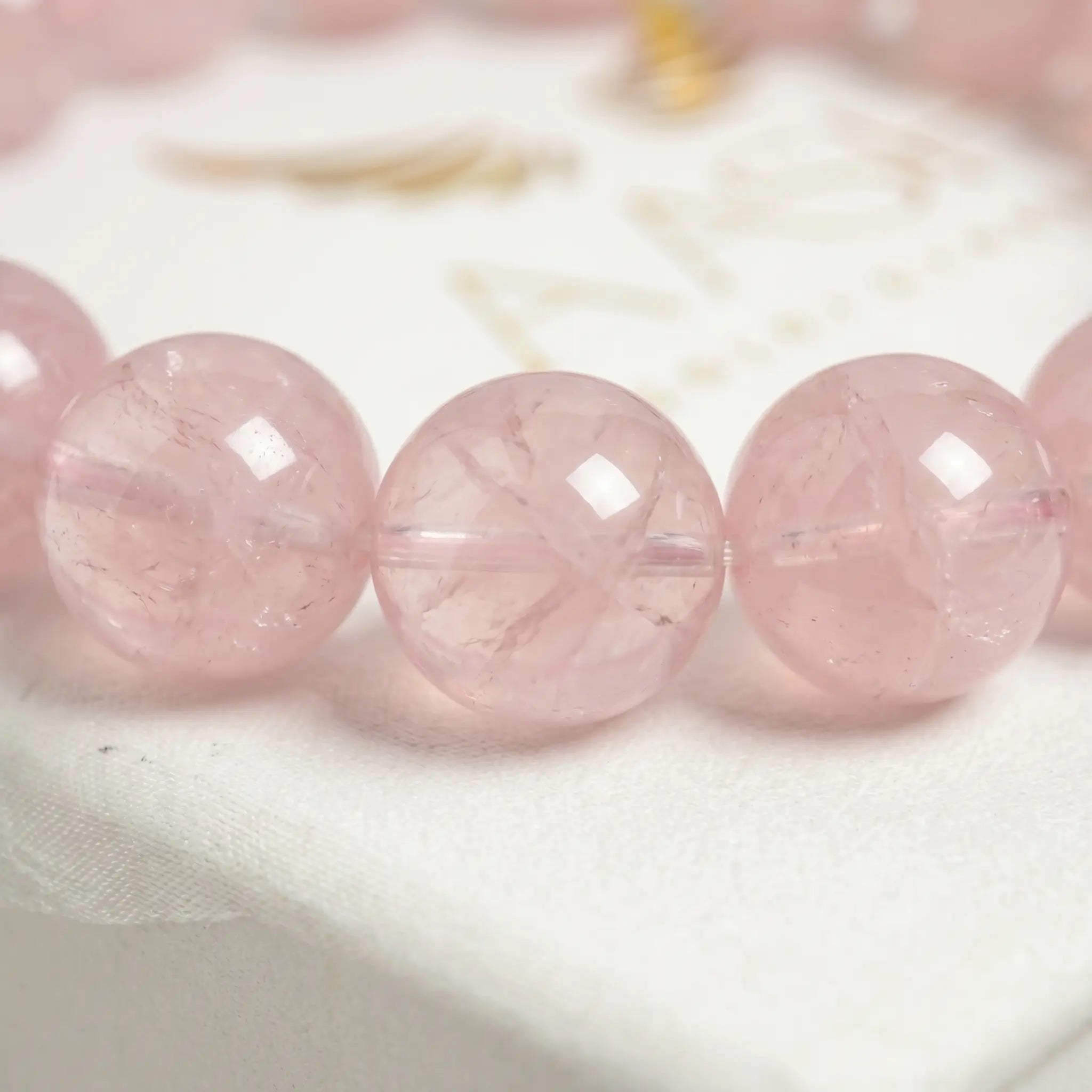 rose quartz bracelet natural stone beads close up pink detail