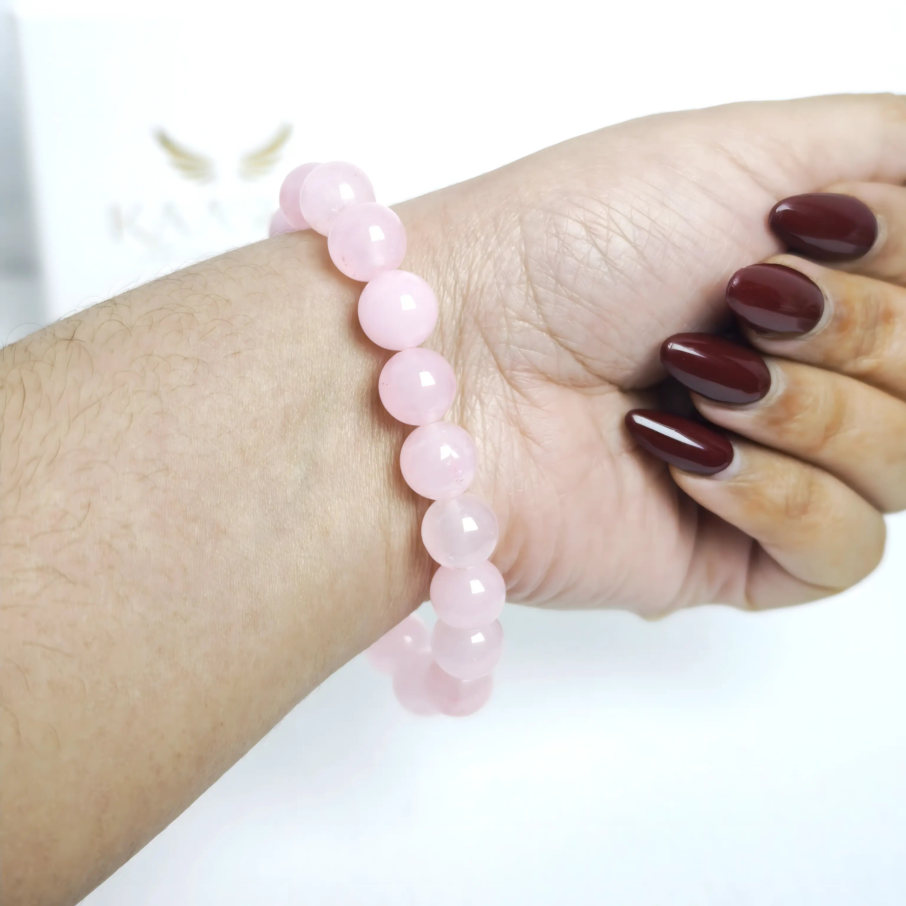 rose quartz bracelet worn on wrist healing crystal love energy